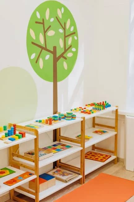 Brightly colored educational toys neatly arranged on open shelves in a kindergarten classroom.